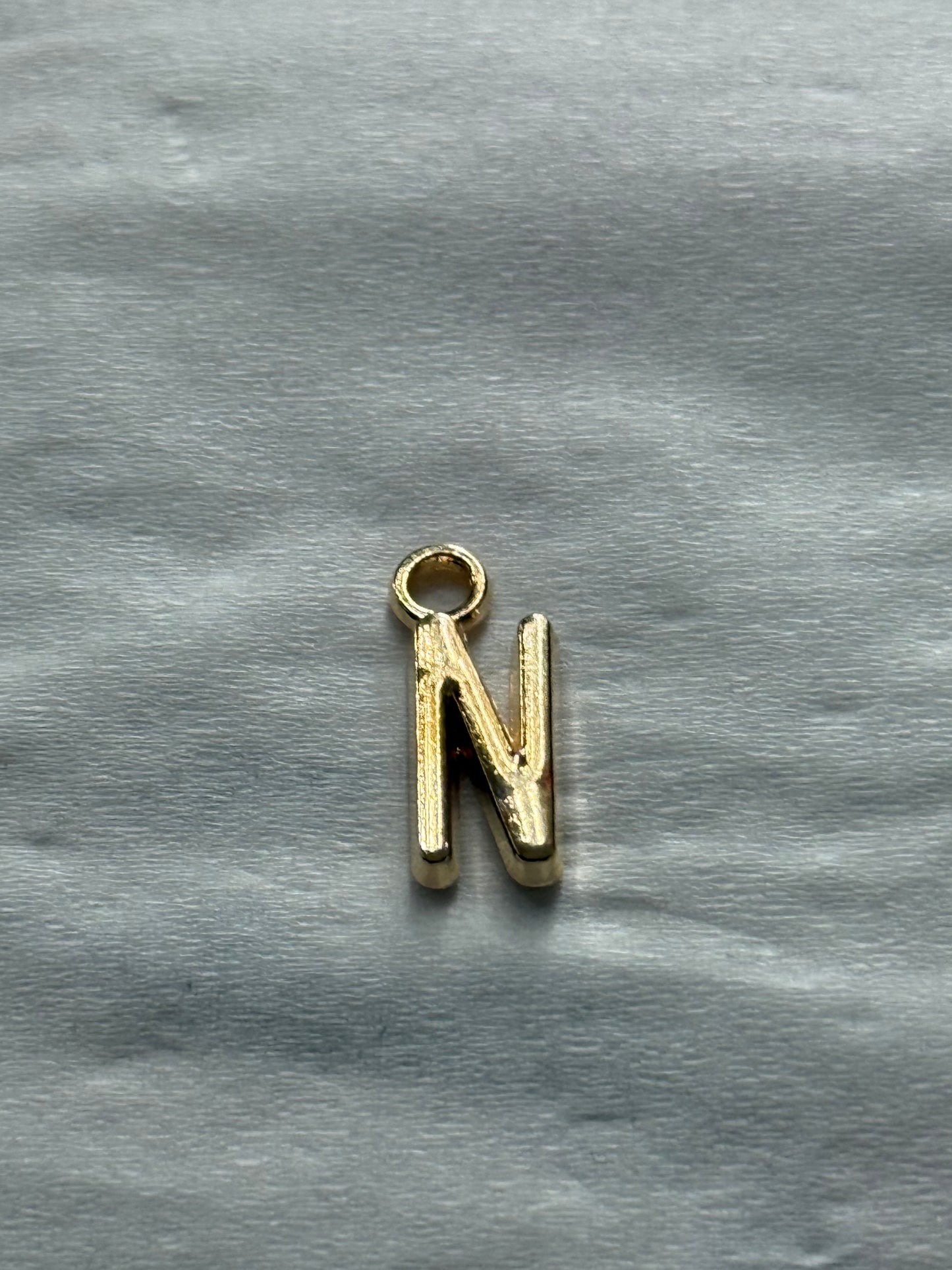 Permanent charm initials